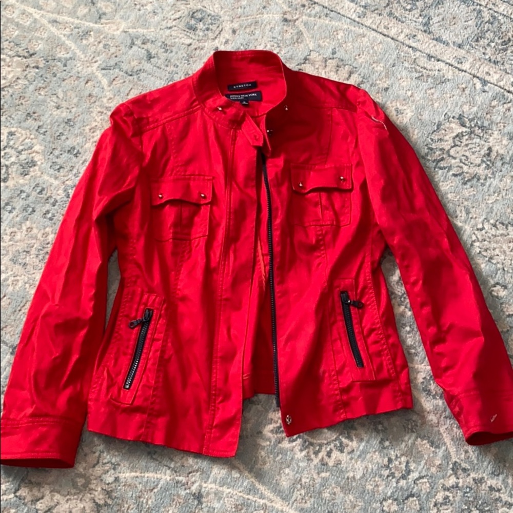 Red zip up jacket. Size medium. Stretch.